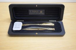 A one off special Parker Duofold converter / cartridge fountain pen and ballpoint pen in gold