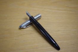 A Sheaffer Craftsman touchdown fill fountain pen in black with chrome cap having a Sheaffer M1