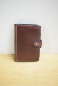 A Glen Royal pocket organiser in red leather 15.5 x10.5cm