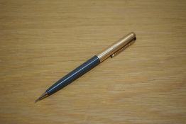 A Parker 51 propelling pencil in grey with rolled gold cap.