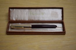 A boxed Parker 51 MKII aerometric fill fountain pen in dark maroon with rolled gold cap