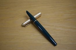 A Parker 51 MKII Demi aerometric fill fountain pen in forest green rolled gold cap. Slight chew to