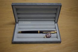 A boxed Parker Premier propelling pencil in brown Chinese Laque