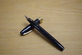 A Sheaffer Imperial IV cartridge fill fountain pen in black with gold trim having Sheaffer 14K 585