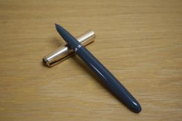 A Parker 51 MKII aerometric fill fountain pen in grey with rolled gold cap.