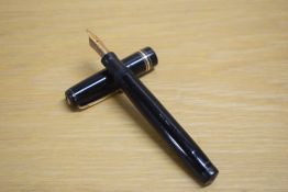 A Mabie Todd & Co Swan 2060 leverless twist fill fountain pen in black with one broad and two narrow