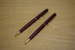 Two Waterman Hemisphere ballpoint pens in Flame Red