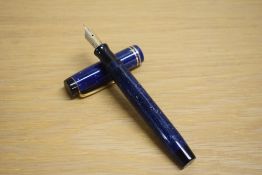 A Parker Duofold Senior button fill fountain pen in lapis lazulii with two gold bands to the cap
