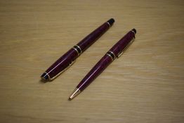 A Waterman Expert rollerball pen and ballpoint pen in Flame red