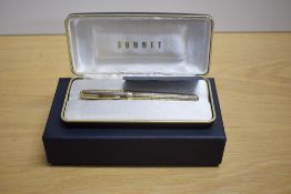A boxed Parker Sonnet Vermeil Crocodile converter fill fountain pen in gold plate having Parker