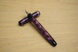 A Parker Televisor Standard button fill fountain pen in rose lined pattern with three narrow gold