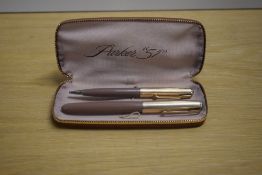 A boxed Parker 51 aerometric fill fountain pen and propelling pencil set in Cocoa with Gold fill