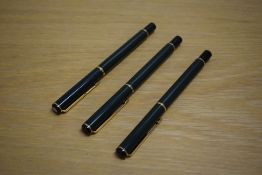 A Parker Rialto converter fill fountain pen and two Rollerball pens in Laque Dark Green