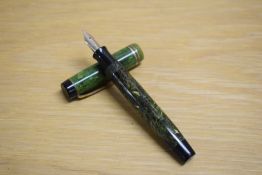 A Parker Duofold Junior button fill fountain pen in Jade Green with two bands to the cap having