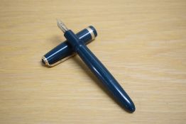 A Parker Duofold aerometric fill fountain pen in green with chevron cap band having Parker 14K