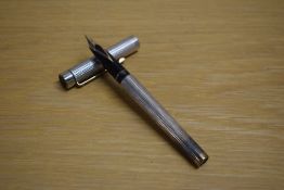 A Sheaffer Targa 1010X GT Classic converter cartridge fill fountain pen in silver plated diamond