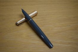 A Parker 51 MKIII aerometric fill fountain pen in grey with rolled gold cap.