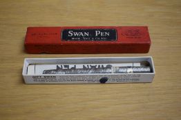 A boxed Mabie Todd & Co Swan self filler lever fill fountain in grey and ruby snakeskin having