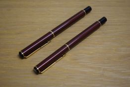 Two Parker Rialto converter fill fountain pens in Metallic Maroon