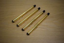 Three Parker Rialto converter fill fountain pens and a rollerball in Cornith Gold plate