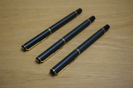 Two Parker Rialto converter fill fountain pens and a rollerball pen in Matte Dark Green