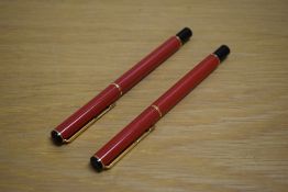 Two Parker Rialto rollerball pens in Lacky Chinese Red one needs refil