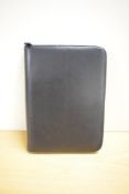 A boxed Tavecchi organiser, zip closed in leather 19.5 x16cm