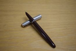 A Parker 51 vacumatic fill fountain pen in Cordovan Brown with lustraloy cap with jewellers band and