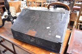An 18th Century and later dark oak bible box, some carving to front, width approx. 58cm