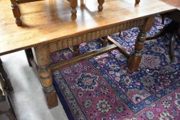 A traditional oak refectory style dining table, approx. 153 x 82cm