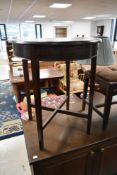 An early 20th Century mahogany circular top occasional table, diameter approx. 61cm