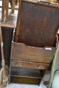 An early 20th Century magazine stand, having bookshelf under, two trays and a carpet beater