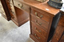 A reproduction Regency style mahogany filing cabinet and a Victorian style pedestal desk, width
