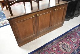 A modern dark oak effect sideboard or dresser base, dimensions W152 D61 H77cm