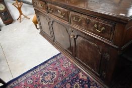 A period oak dresser base, width approx. 190cm