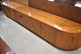 A selection of vintage teak G plan base units , comprising double cupboard, single cupboard and
