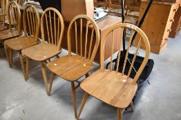 A set of five Ercol low hoop and stick back kitchen dining chairs