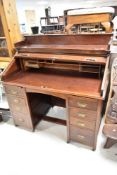 A late 19th or early 20th Century mahogany roll top desk, width approx. 122cm