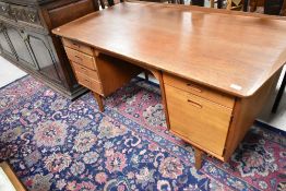 A vintage Scandinavian teak desk, Svend and Madsen design , marked to drawers Made in Denmark with