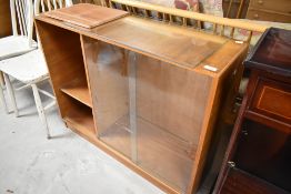 A vintage sapele bookcase, approx. width 96cm