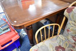 A Victorian mahogany extending dining table , approx W103, length 111 plus two additional leaves