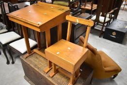 A vintage plywood childs desk and chair set