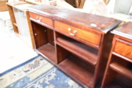 A reproduction Regency mahogany low bookshelf, width approx. 122cm