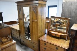 A late 19th/early 20th Century oak three piece bedroom suite , Arts & Crafts design comprising