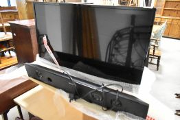 A Panasonic 32inch TV and a Bush soundbar
