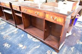 A reproduction Regency mahogany low bookshelf, width approx. 152cm