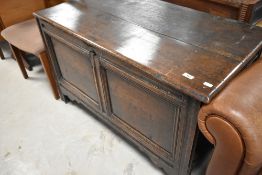 A Period oak two panelled coffer/kist, width approx. 106cm