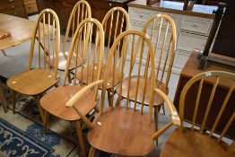A set of Six (five plus one) Ercol low hoop and stick back kitchen dining chairs