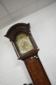 An 18th Century long cased clock having brass and silvered dial, eight day movment , named for