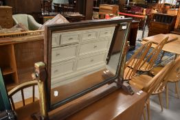 An oak dressing table with painted detail